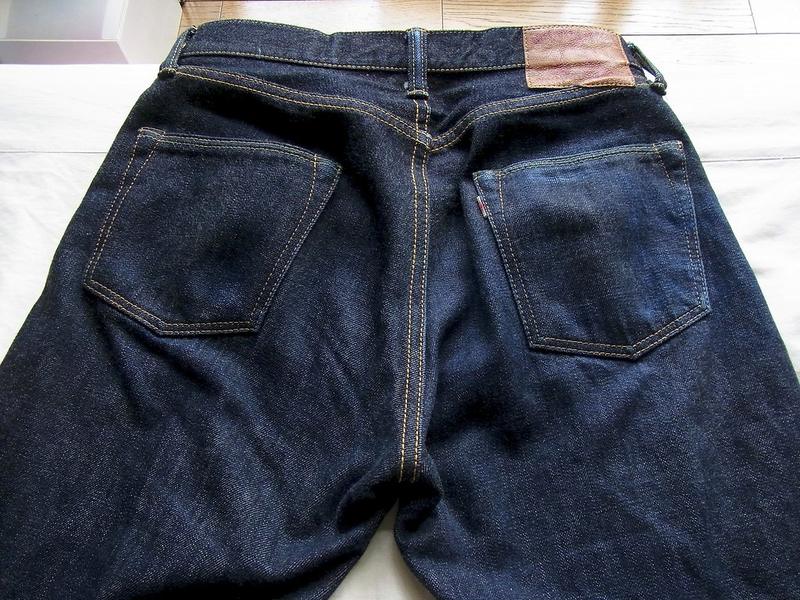 Dark selvedge denim jeans, back pockets up